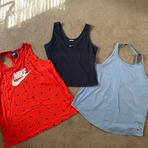 3 Nike tanks in size XL